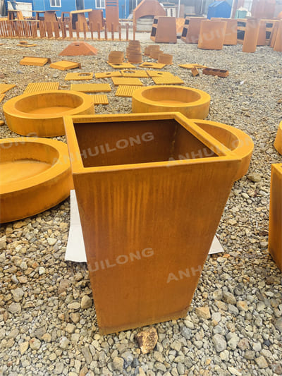 Tall and sleek corten steel planter for outdoor